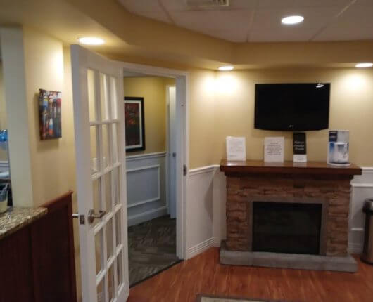 Dental clinic door and T.V. mount on wall